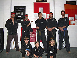 Sensei Paul, Shihan John Ang and members with Grant Certificate